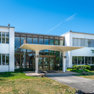 Picture of front of the GSA Regional HQ Building located in Auburn WA and is part of the Pacific Point property sales
